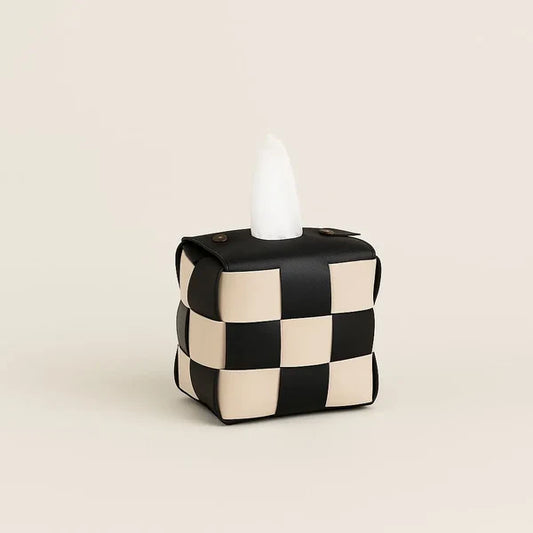 Checkerboard woven tissue box cover on bathroom counter